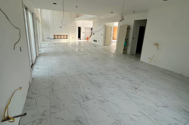 Finished polished large-format porcelain floor by Silcam Tile